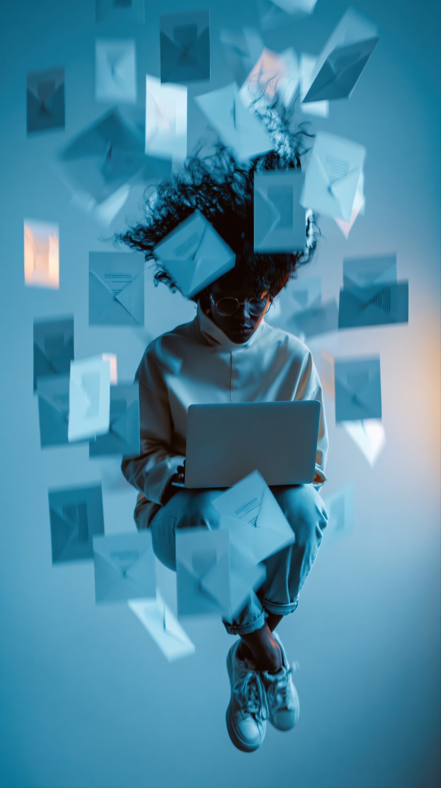 A creator working late on a laptop